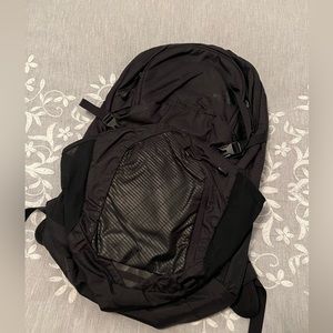 North Face black day pack, city back pack. Laptop pouch. Chest strap.